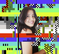 "Adult woman with a toothy smile looking at the camera with her arms to her sides with a background of colorful digital blocks