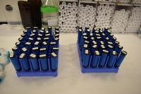 blue sample vials on a countertop